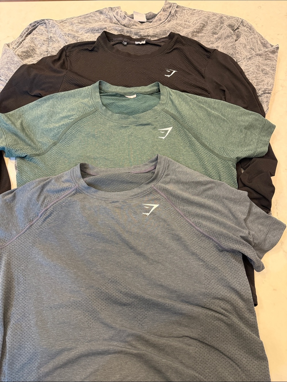 Gymshark Men’s Bundle of 4 shirts size small